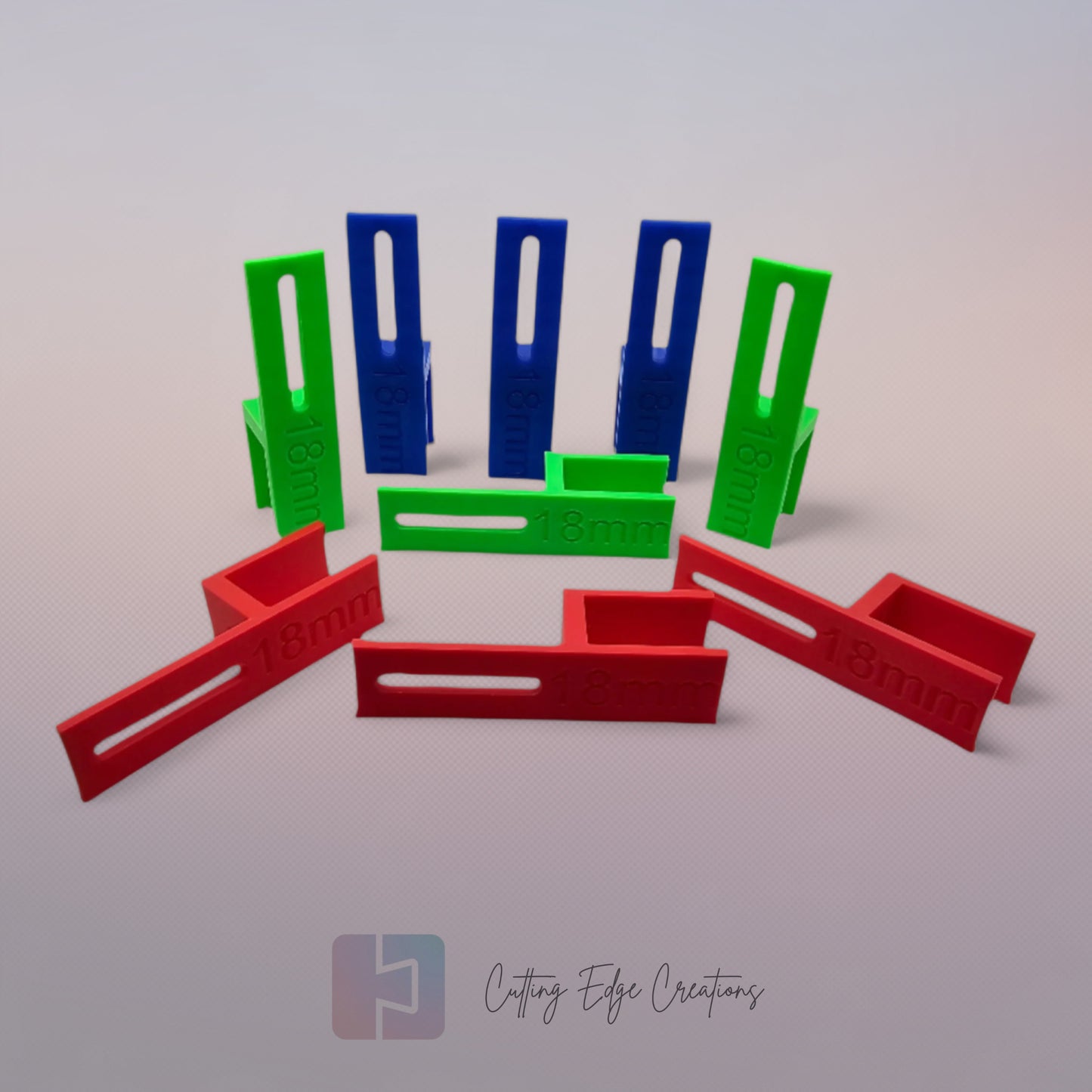 Set of three U Scribe jigs in bright colours for cabinet scribing and panel fitting