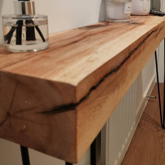 Solid oak console table with black hairpin legs, handmade in the UK, modern rustic furniture.