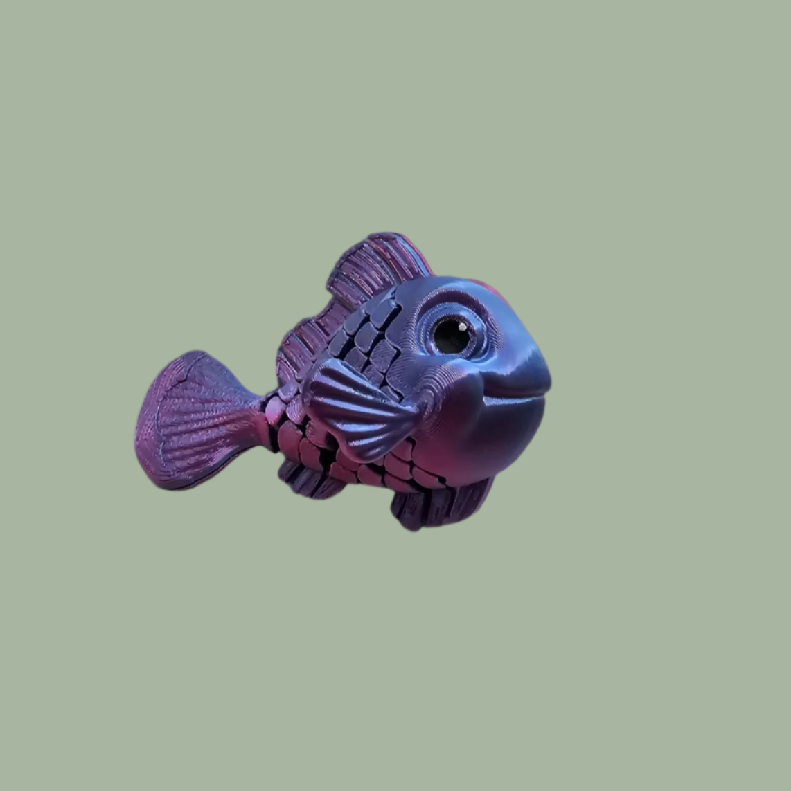 3D printed articulated fish in a random shiny colour