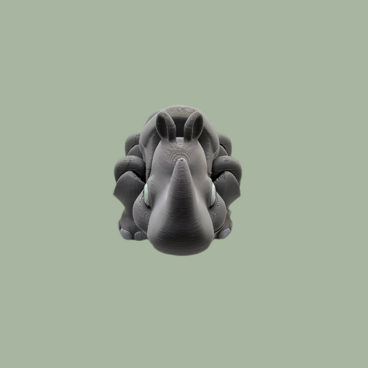 3D printed grey rhino with button mechanism to perform a running motion