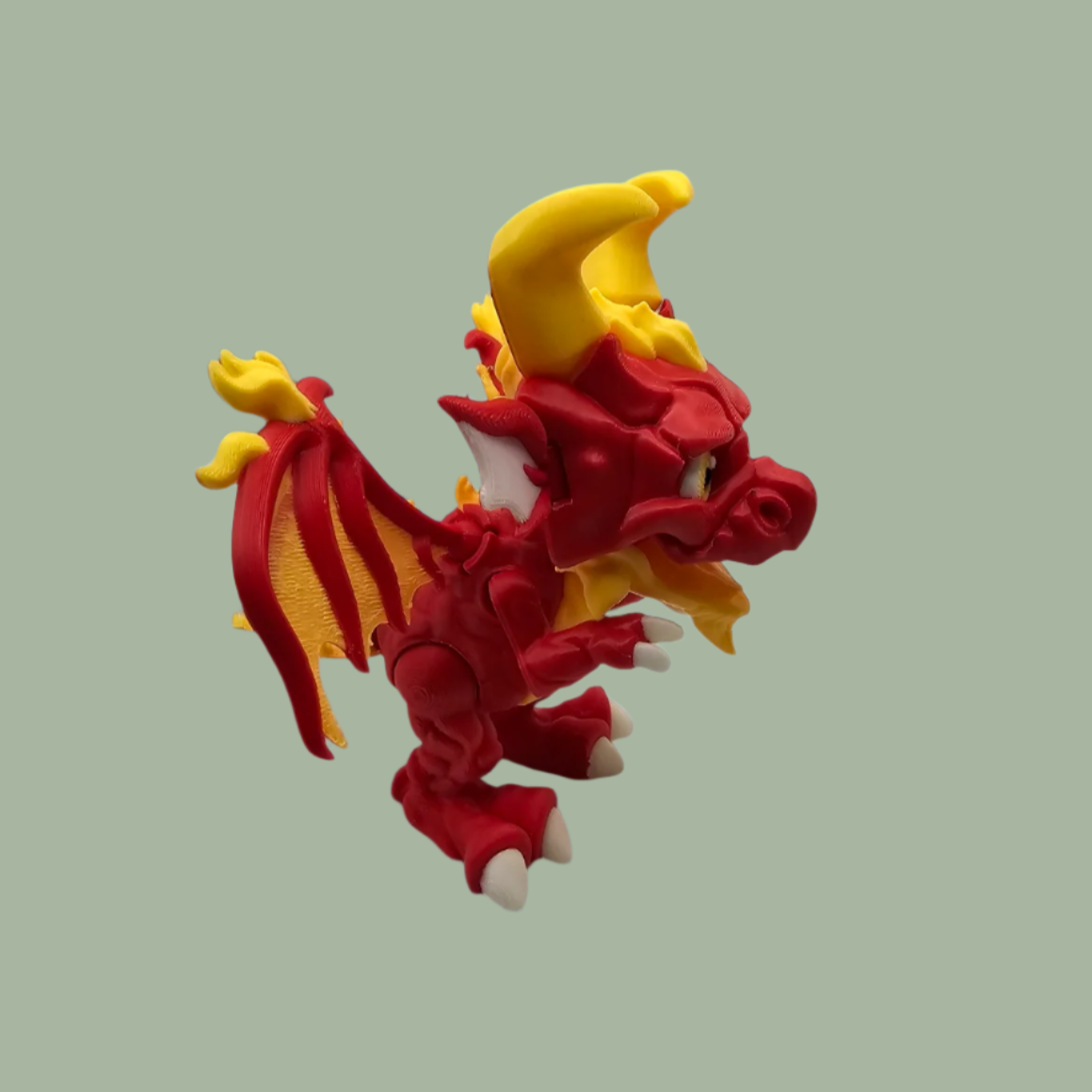 3D printed dragon figurine with fixed wings with red and yellow flame details