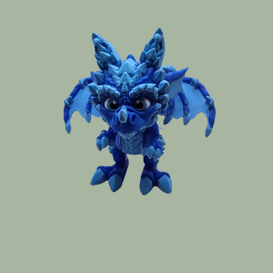 3D printed dragon figurine with fixed wings with light and dark blue ice crystal details