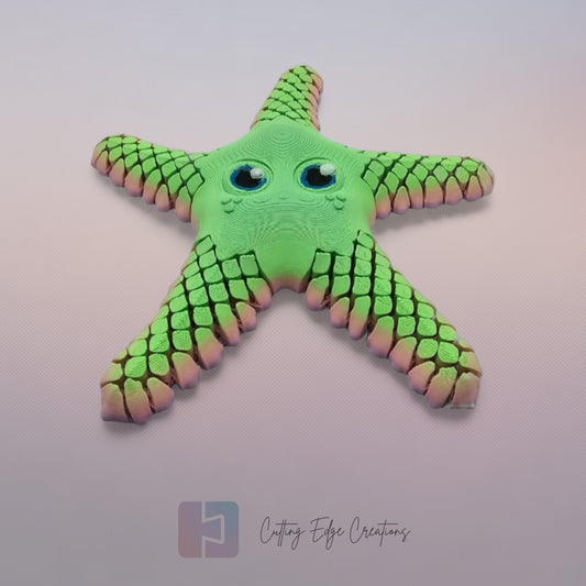 3D printed starfish with mesh articulated arms in a random pastel rainbow colour
