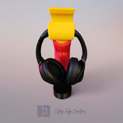 3D printed block style arm in various colours, with black base for wall or freestanding mounting, with chunky yellow hand to hold headphones or coats