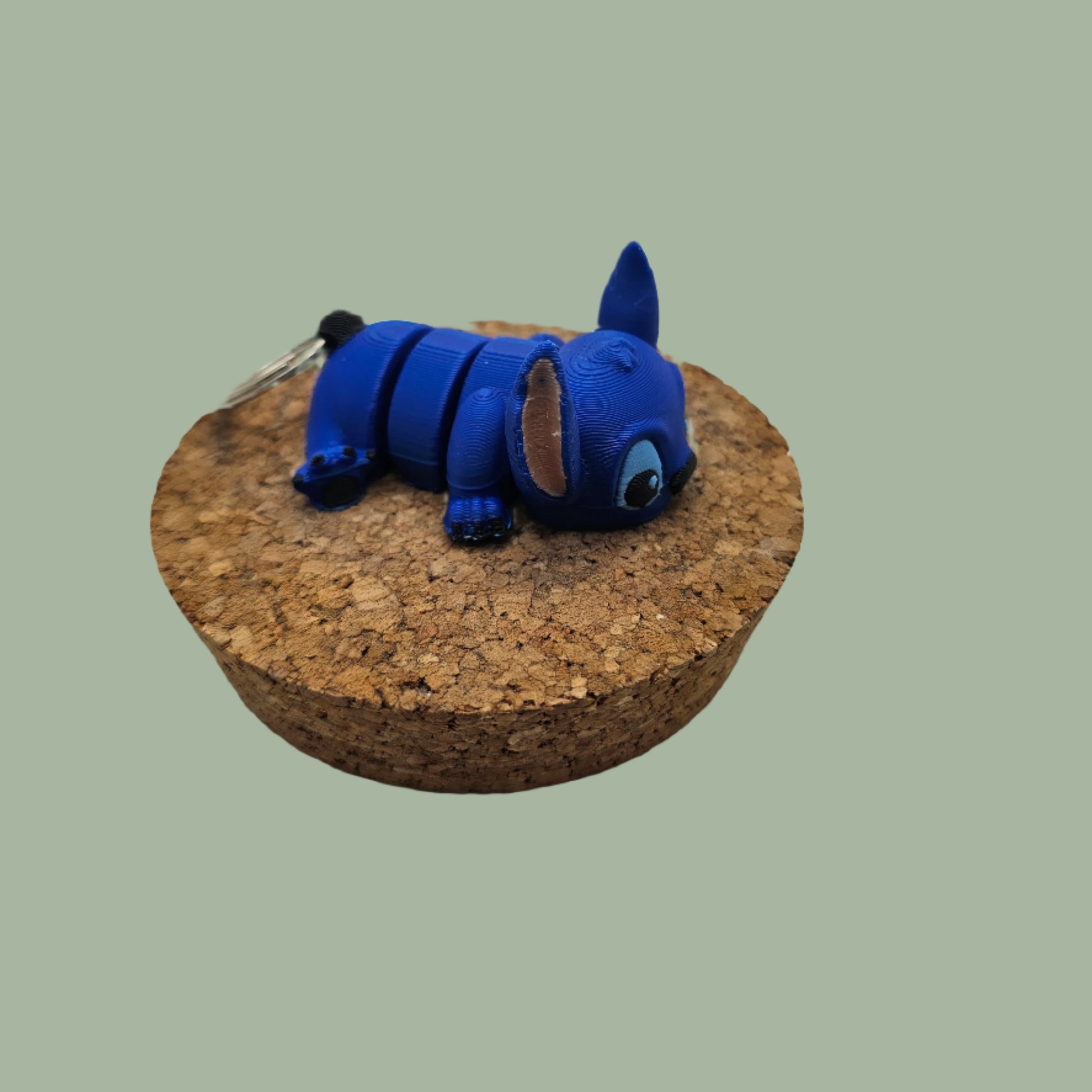 3D printed articulated blue Stitch style keyring