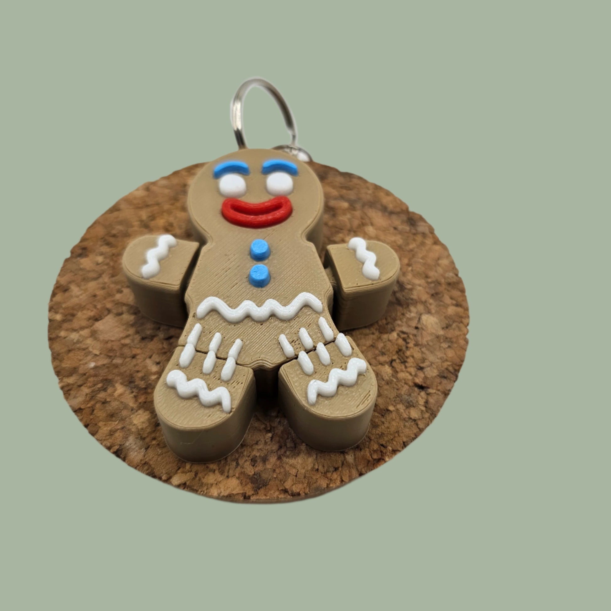 3D printed articulated gingerbread man  keyring with icing details