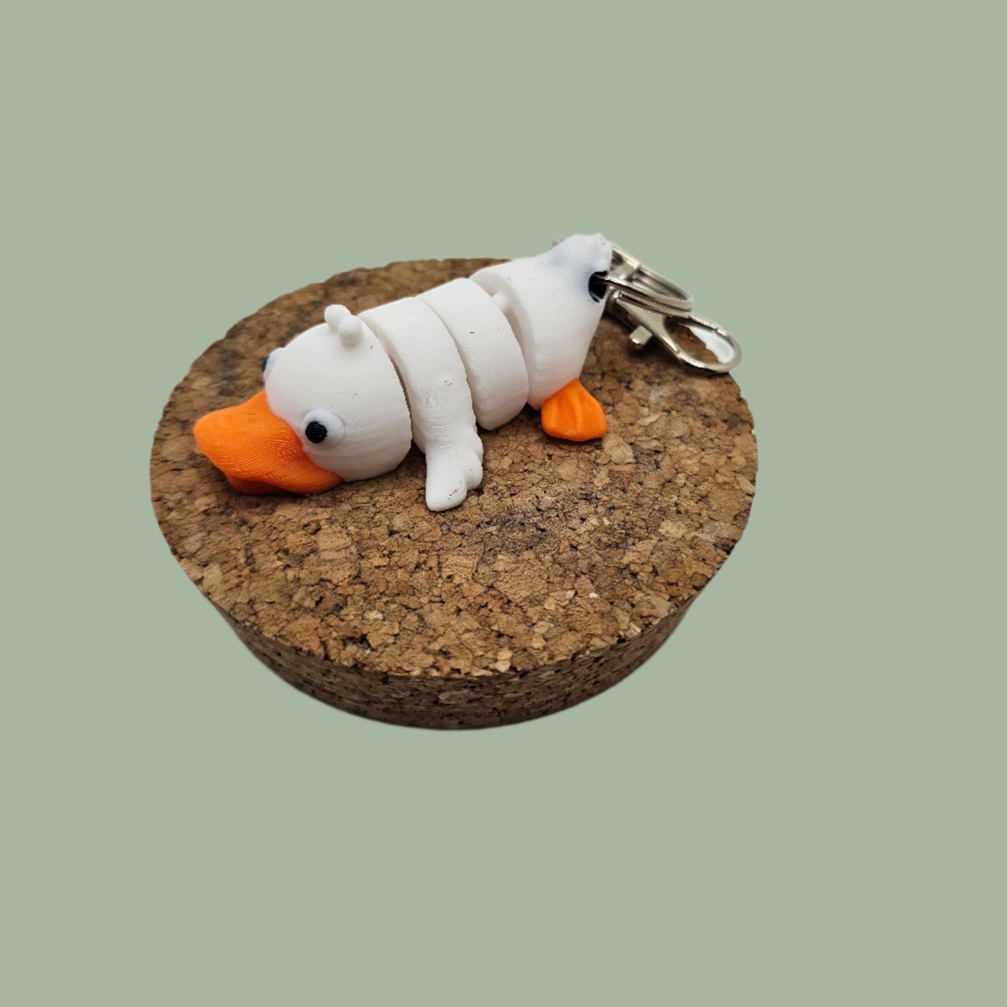 3D printed articulated white and orange duck keyring