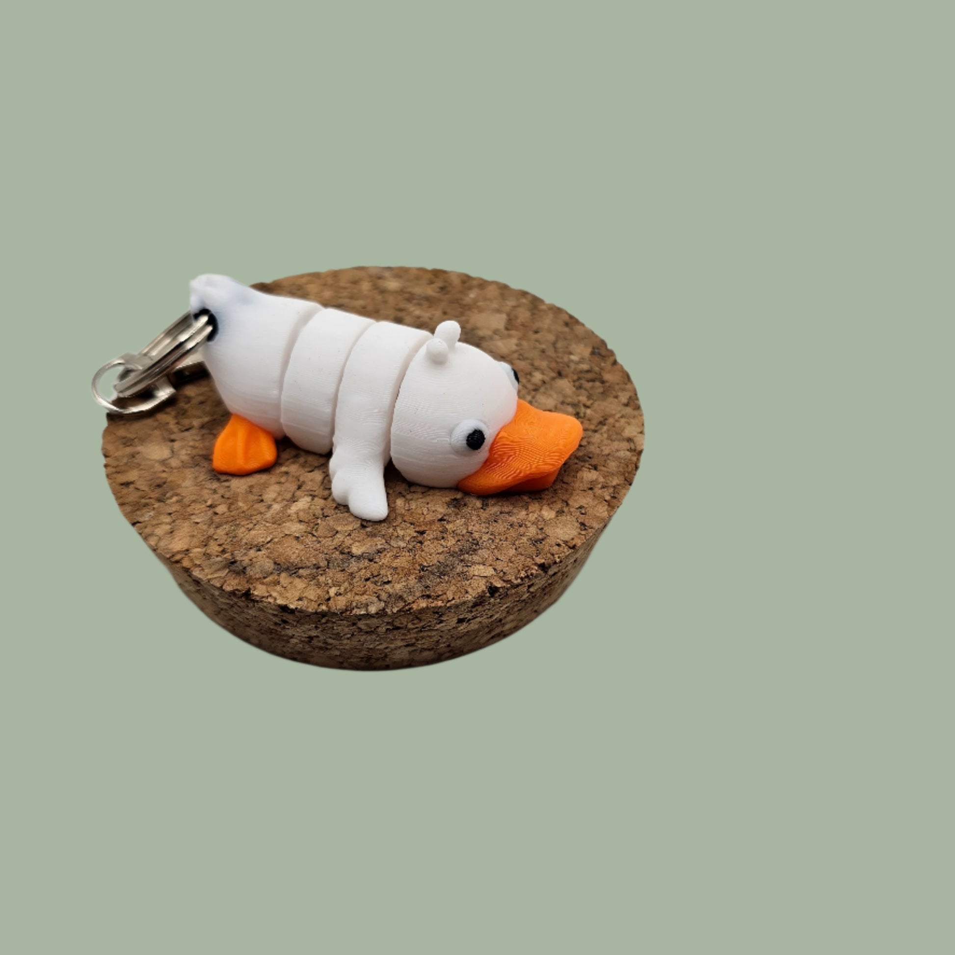 3D printed articulated white and orange duck keyring