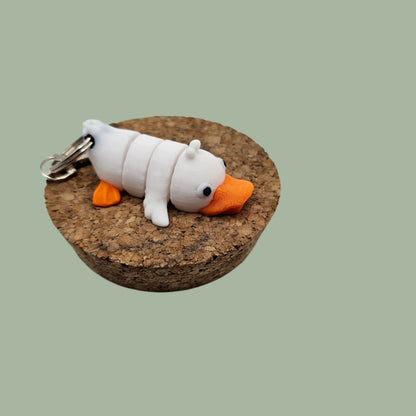 3D printed articulated white and orange duck keyring