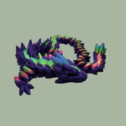 3D printed articulated dragon in a purple colour with rainbow details along the body