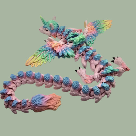 Multicoloured rainbow 3D printed unicorn articulated dragon with wings