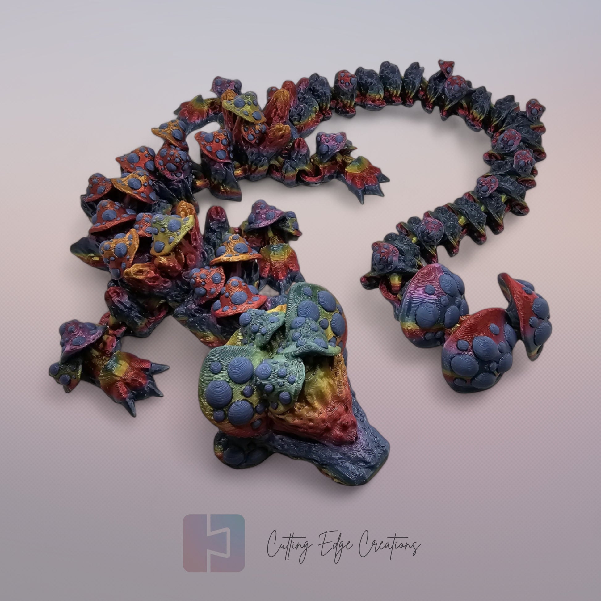 3D printed articulated Mushroom Dragon, flexible toy, handmade in the UK, desk fidget and gift.