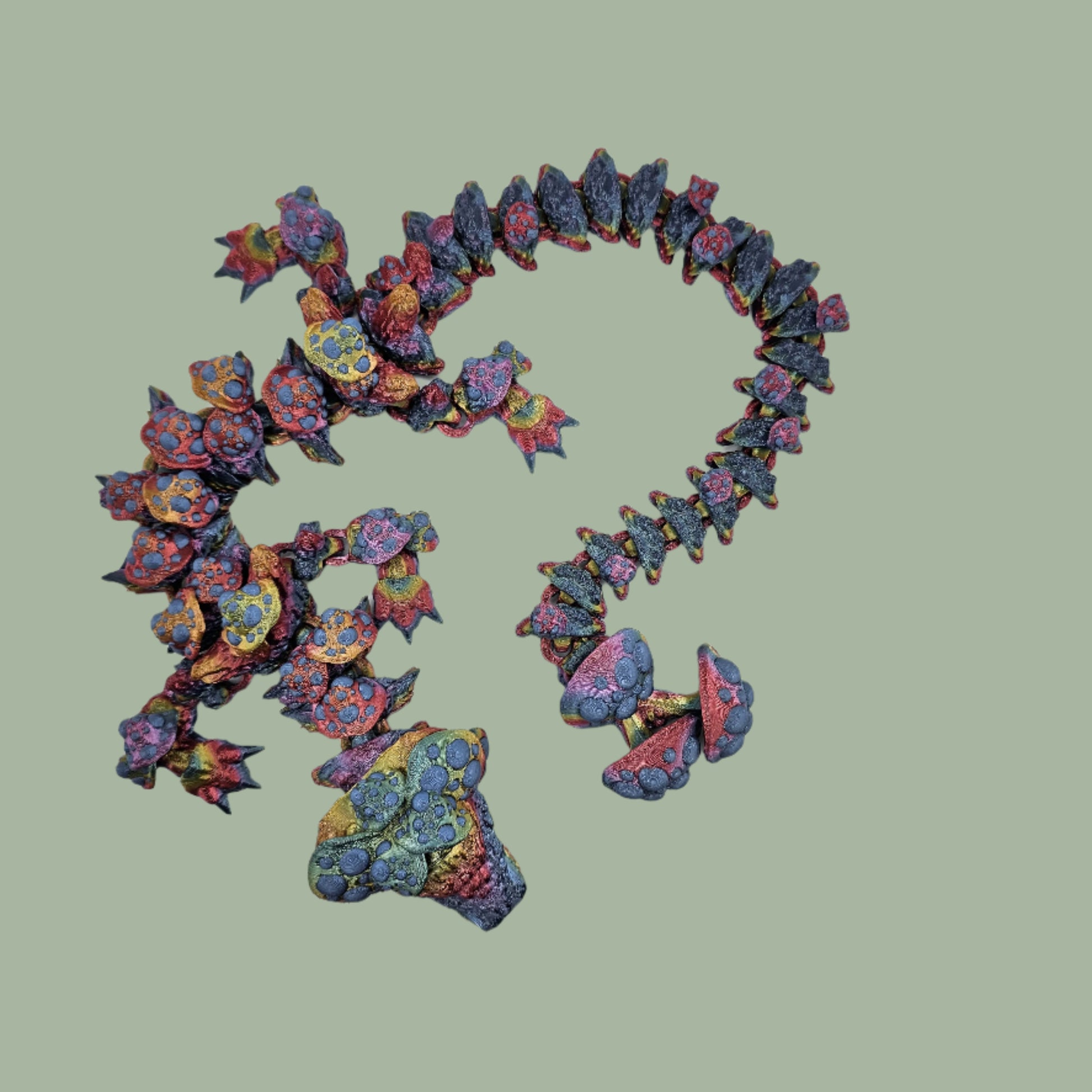 3D printed articulated dragon with mushroom details along the body