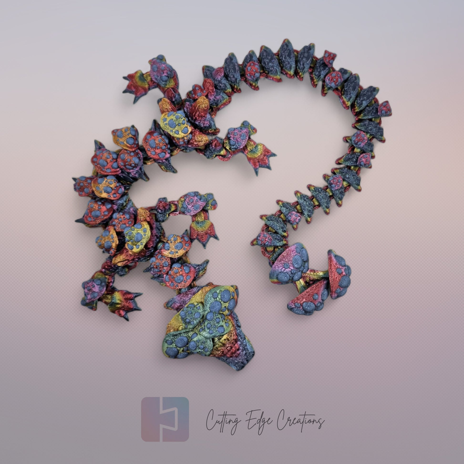 3D printed articulated Mushroom Dragon, flexible toy, handmade in the UK, desk fidget and gift.