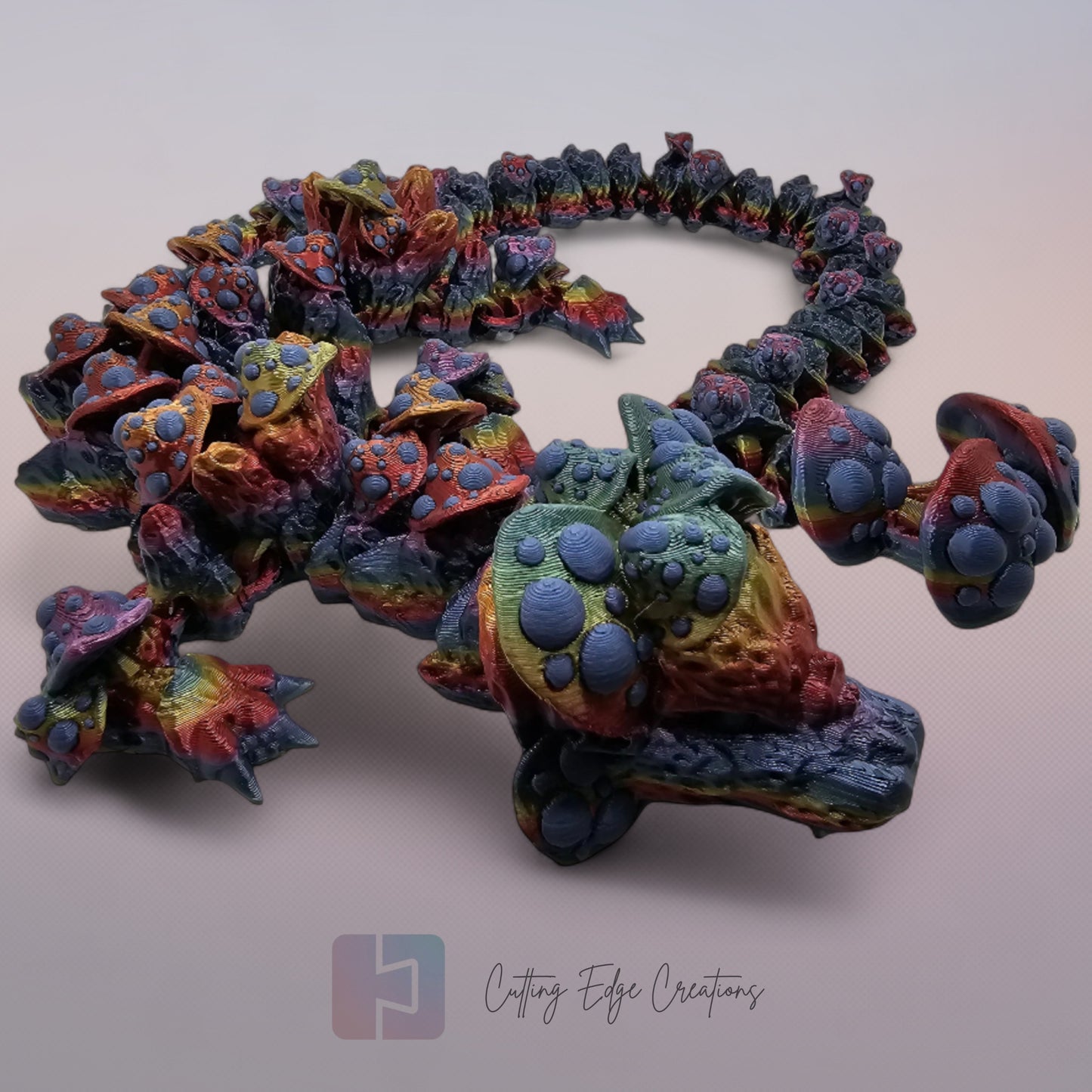 3D printed articulated Mushroom Dragon, flexible toy, handmade in the UK, desk fidget and gift.