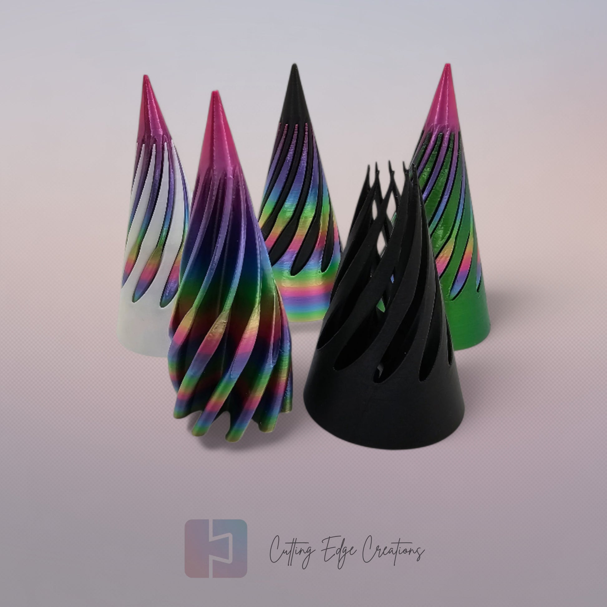vibrant 3D-printed Infinity Cones V2, each featuring a sleek spiral cut design. The cones are in a random colour, including white, green, black, and rainbow gradients. Designed for smooth sliding and fidgeting, these eye-catching desk toys are handmade in the UK