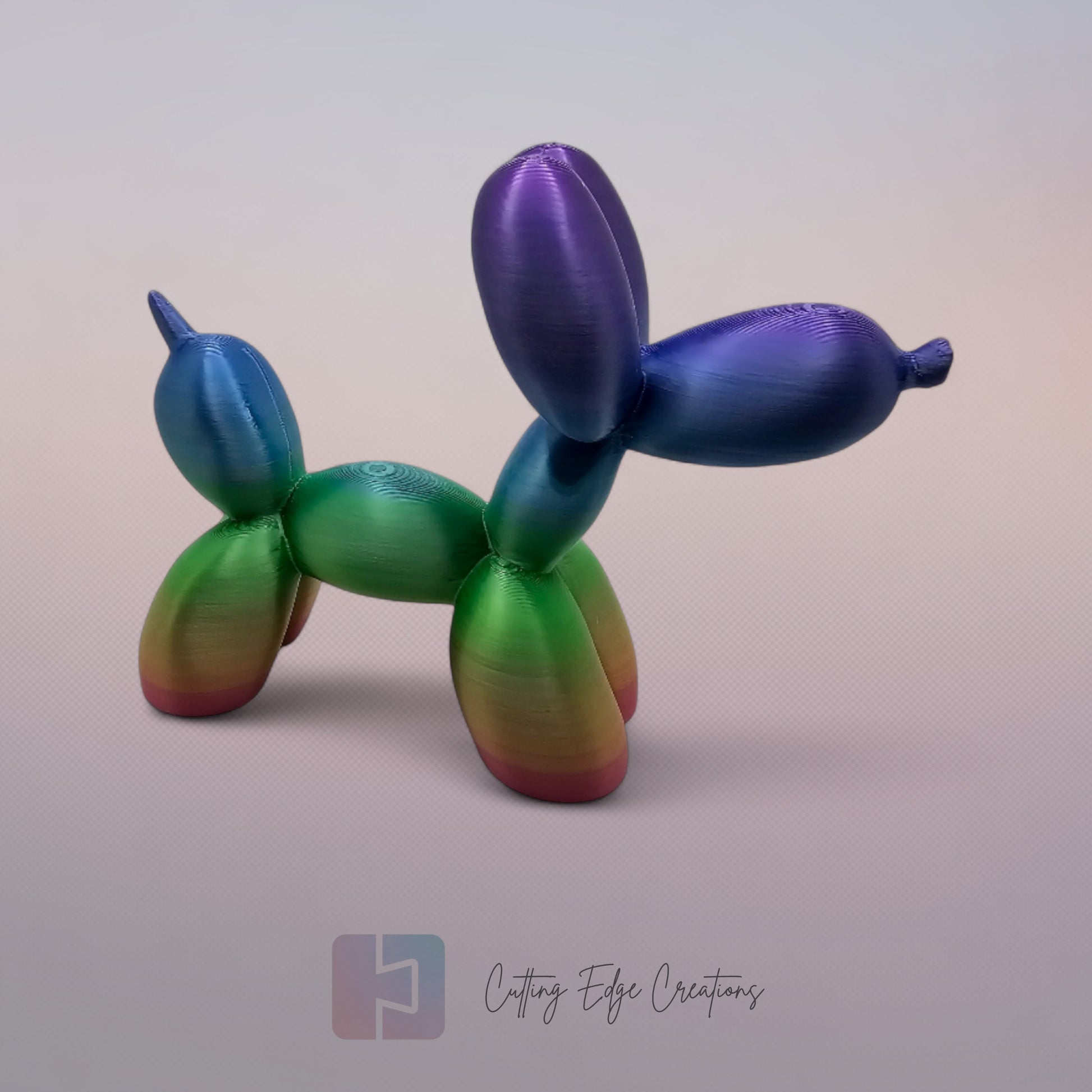 Unique rainbow balloon dog figurine, 3D printed with a smooth, glossy finish. A colourful and fun sculpture for home or office decor