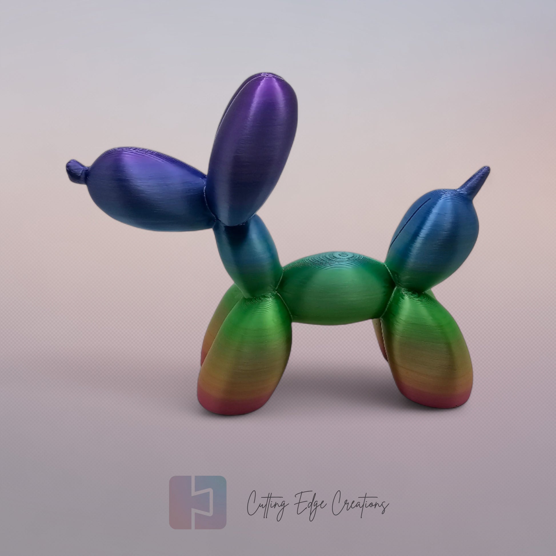Unique rainbow balloon dog figurine, 3D printed with a smooth, glossy finish. A colourful and fun sculpture for home or office decor