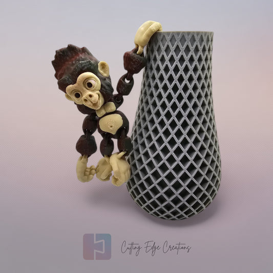 3D printed Hang Around Gorilla figurine with hook hands and feet, designed to hang from shelves, plants, and more.