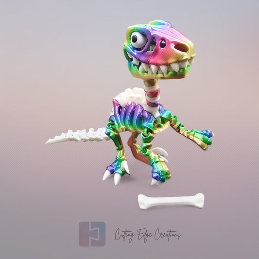 3D-printed rainbow and white skeletal velociraptor flexi toy with articulated joints, opening jaw, and bone accessory. Poseable dinosaur figure, 14cm tall, printed in the UK