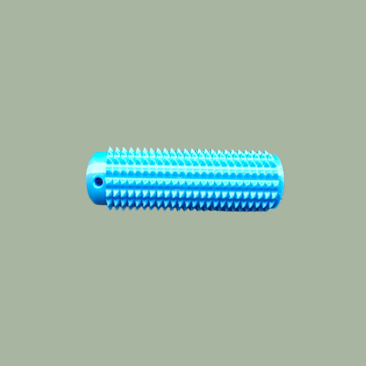 Mini Ouchie Pain Stim – a 7cm long, 3D-printed sensory tool with textured spikes for tactile stimulation, displayed against a neutral background. Includes a keychain for easy portability