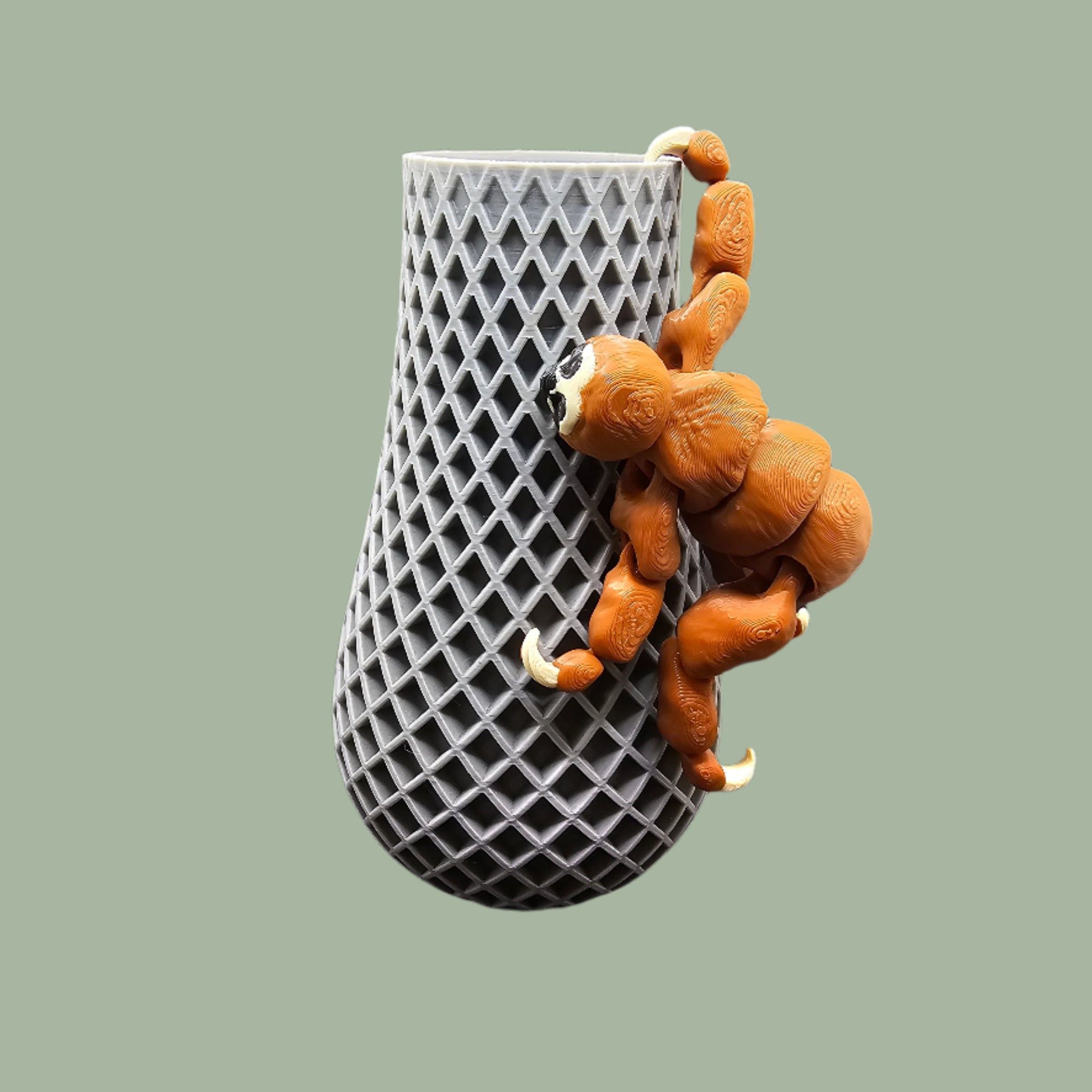 Adorable Hang Around Sloth figurine designed to grip onto plant pots, shelves, and more – perfect for plant lovers
