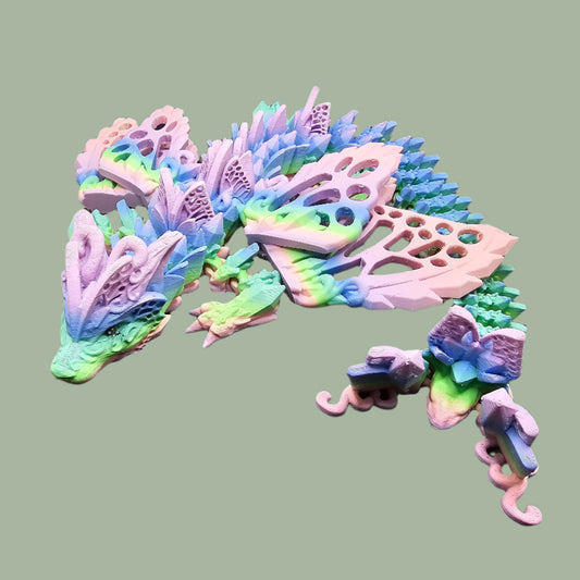 3D printed Wolf Fae Dragon figurine in pastel rainbow colours, featuring intricate butterfly-style wings, crystal-like scales, and an articulated body. Fantasy-inspired, mystical decor piece perfect for collectors and dragon enthusiasts