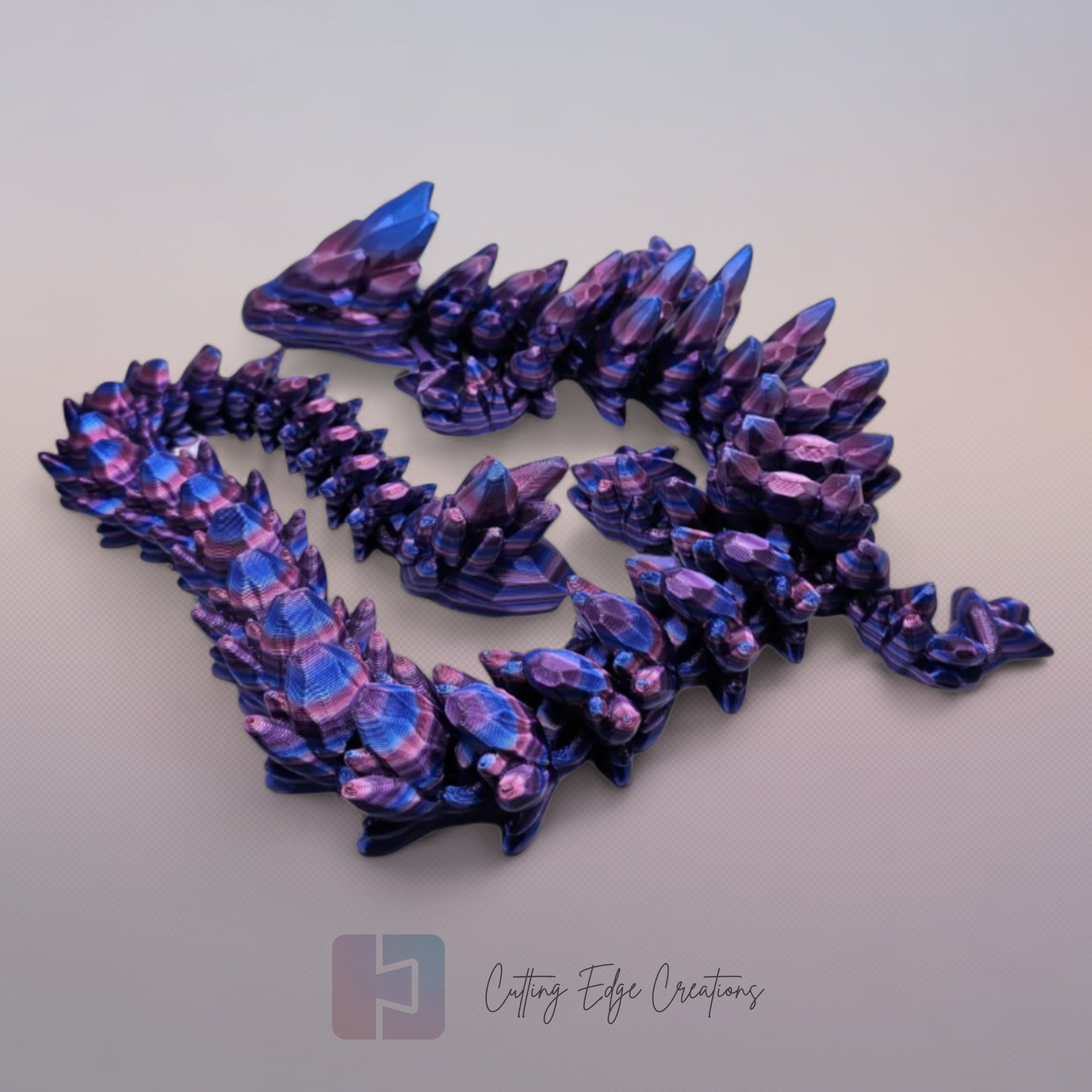 3D printed articulated Gemstone Dragon, flexible toy, handmade in the UK, desk fidget and gift.