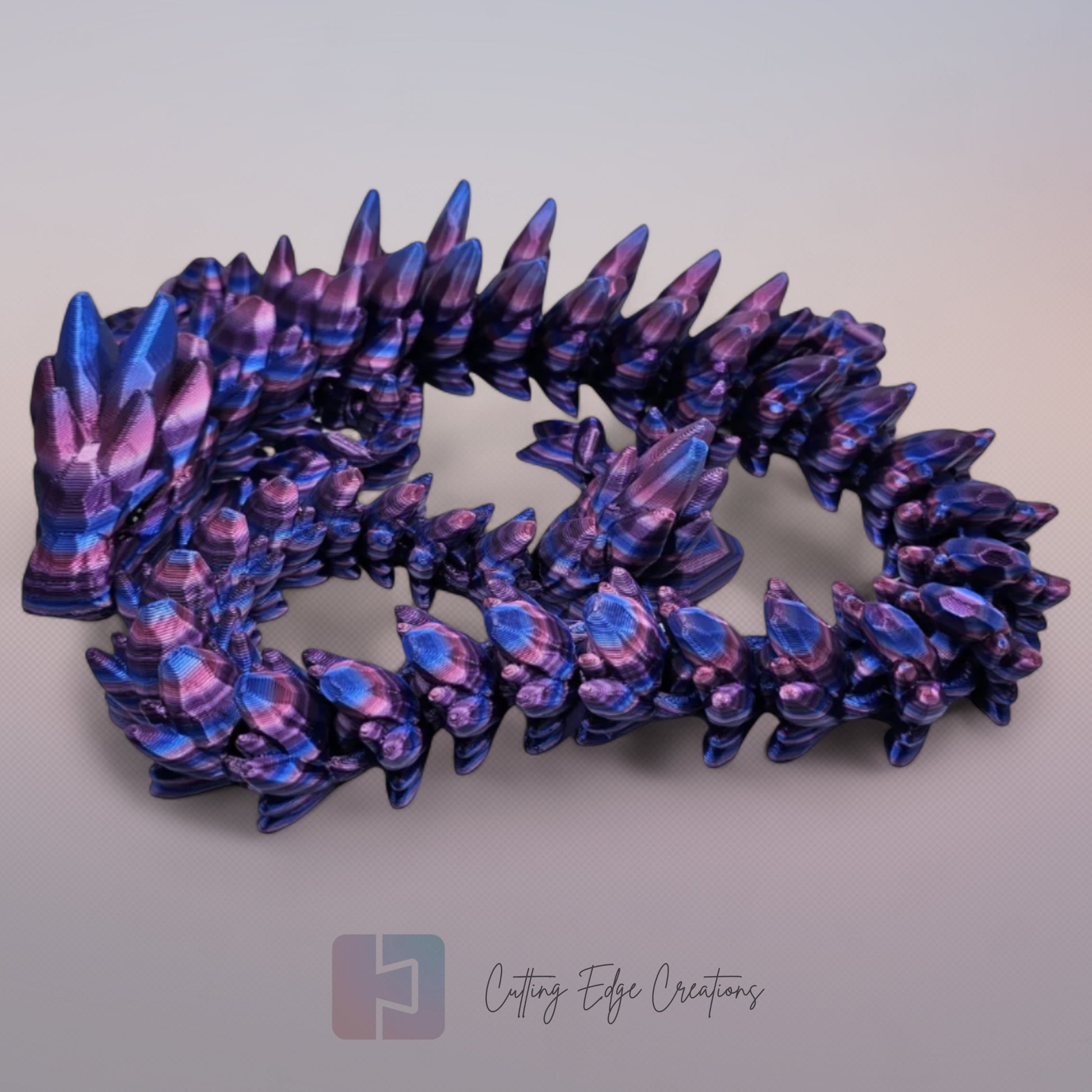 3D printed articulated Gemstone Dragon, flexible toy, handmade in the UK, desk fidget and gift.
