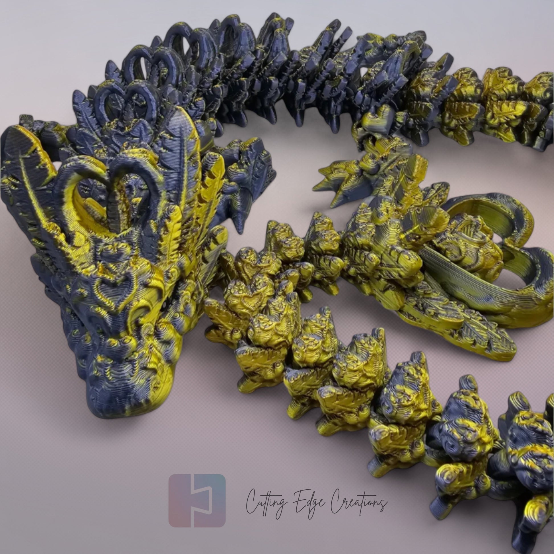 3D printed articulated Heart Dragon, flexible toy, handmade in the UK, desk fidget and gift.