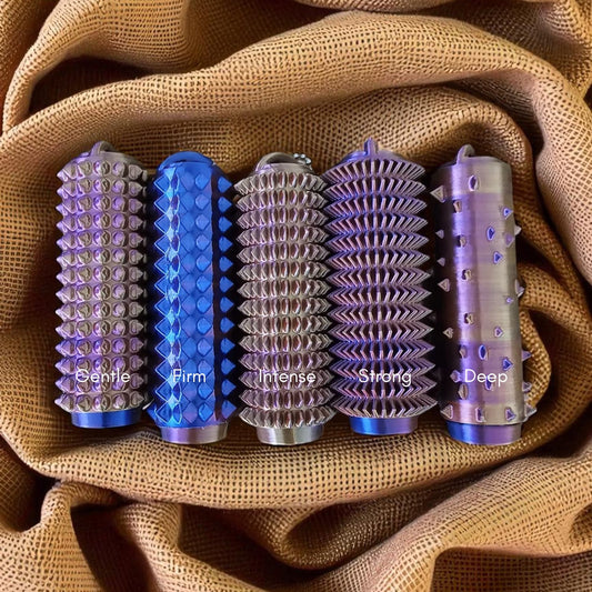 Flat lay of five Levelled Ouchies fidget toys with different textures