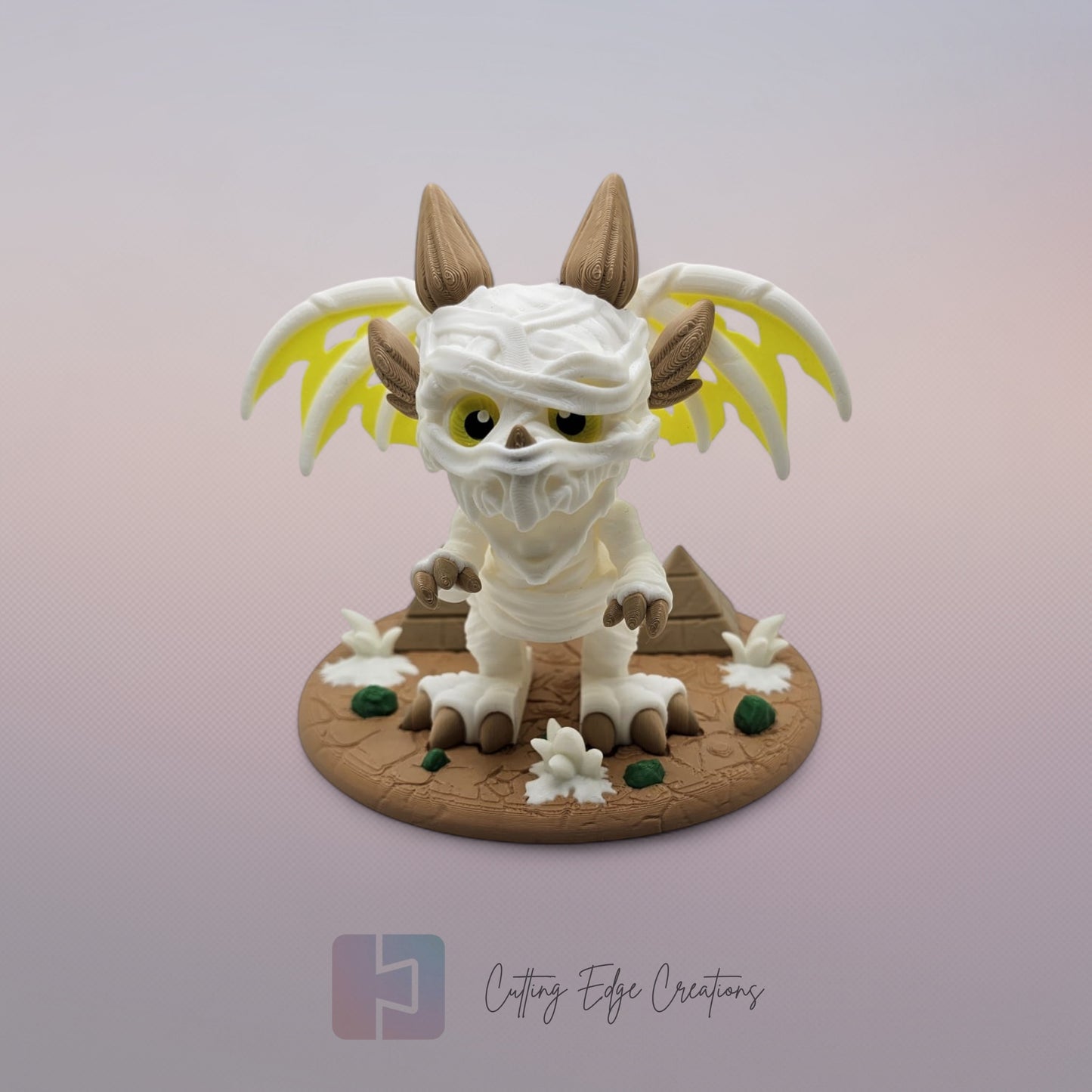 Mummy Dragon: “3D-printed Mummy Dragon figurine, articulated fidget toy with bandage design and display stand, handmade in the UK