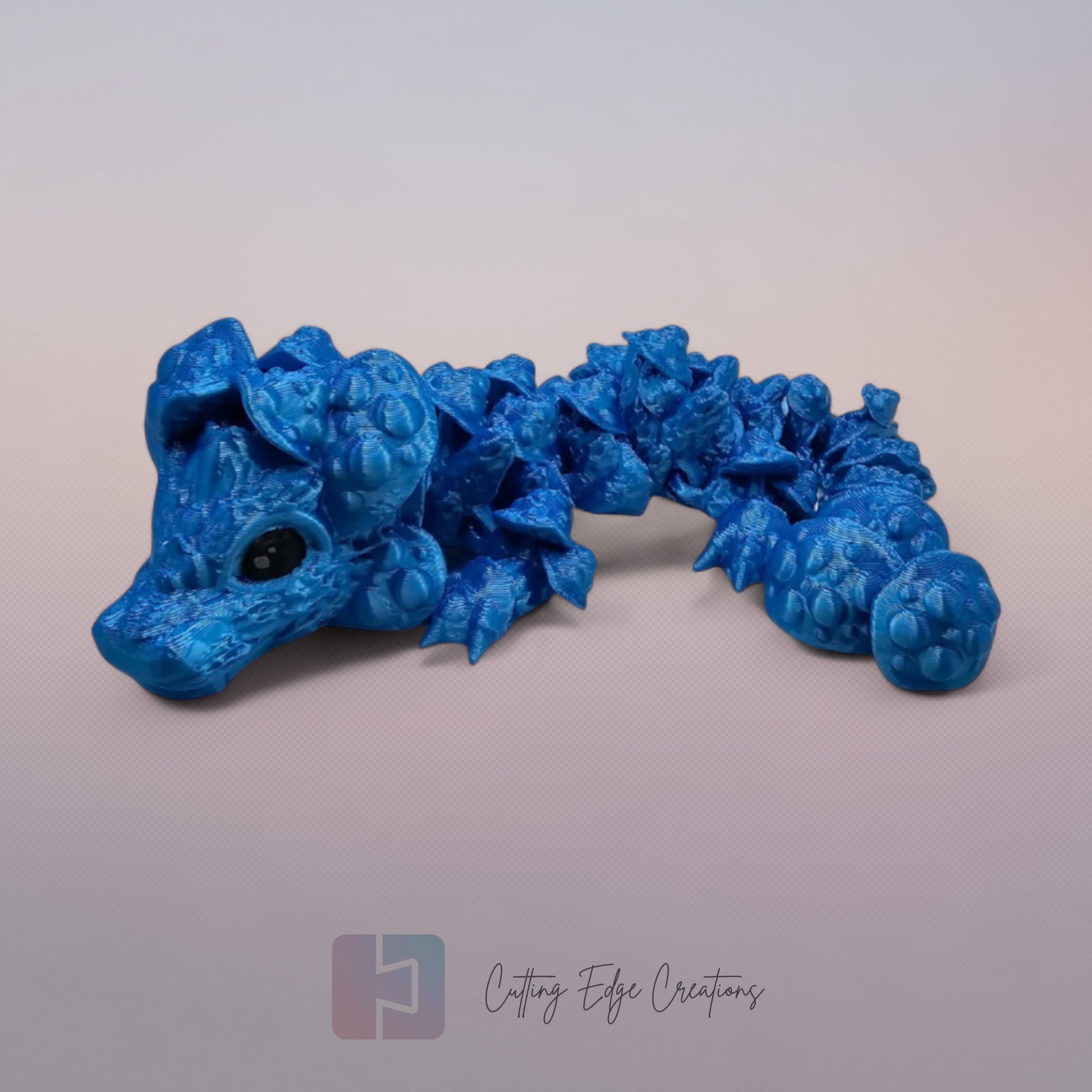 3D printed articulated Mushroom Dragon, flexible toy, handmade in the UK, desk fidget and gift.