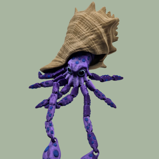 3D printed articulated purple squid with blue spots and removeable shell hat