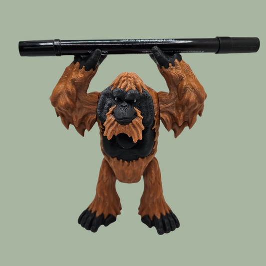3D printed orangutan with articulated arms and legs, designed to hold a pen above it's head