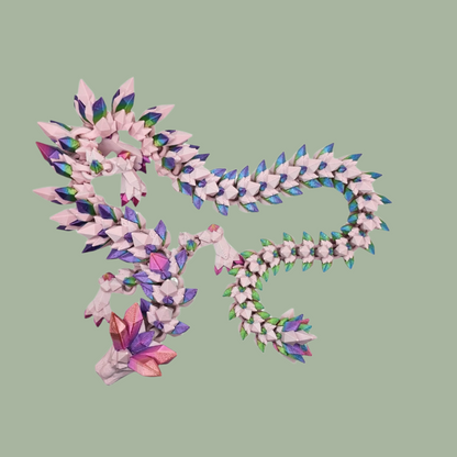 3D printed crystal style dragon in pink with rainbow detail along the body