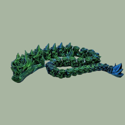 3D printed articulated dragon with rose details along the body