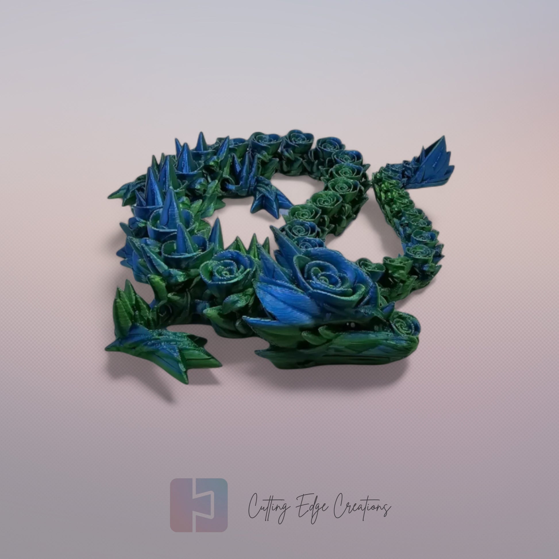 3D printed articulated Rose Dragon, flexible toy, handmade in the UK, desk fidget and gift.