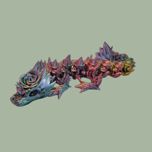 3D printed articulated dragon with rose details along the body