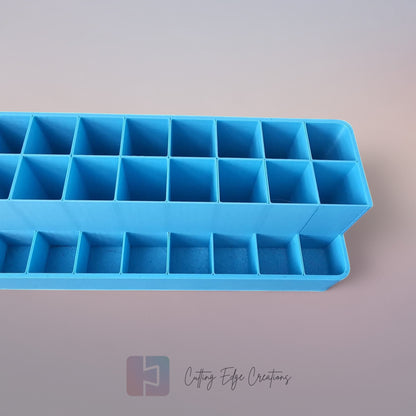 3D printed blending marker and pen stand holding colourful markers and lids on a tidy artist’s desk