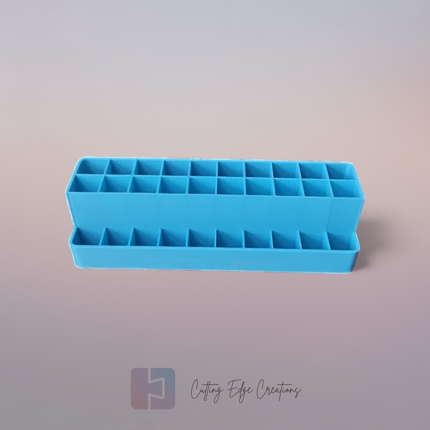 3D printed blending marker and pen stand holding colourful markers and lids on a tidy artist’s desk
