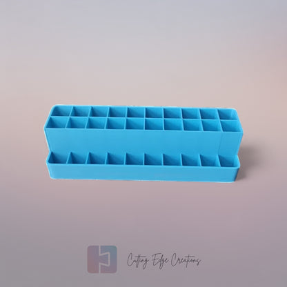 3D printed blending marker and pen stand holding colourful markers and lids on a tidy artist’s desk