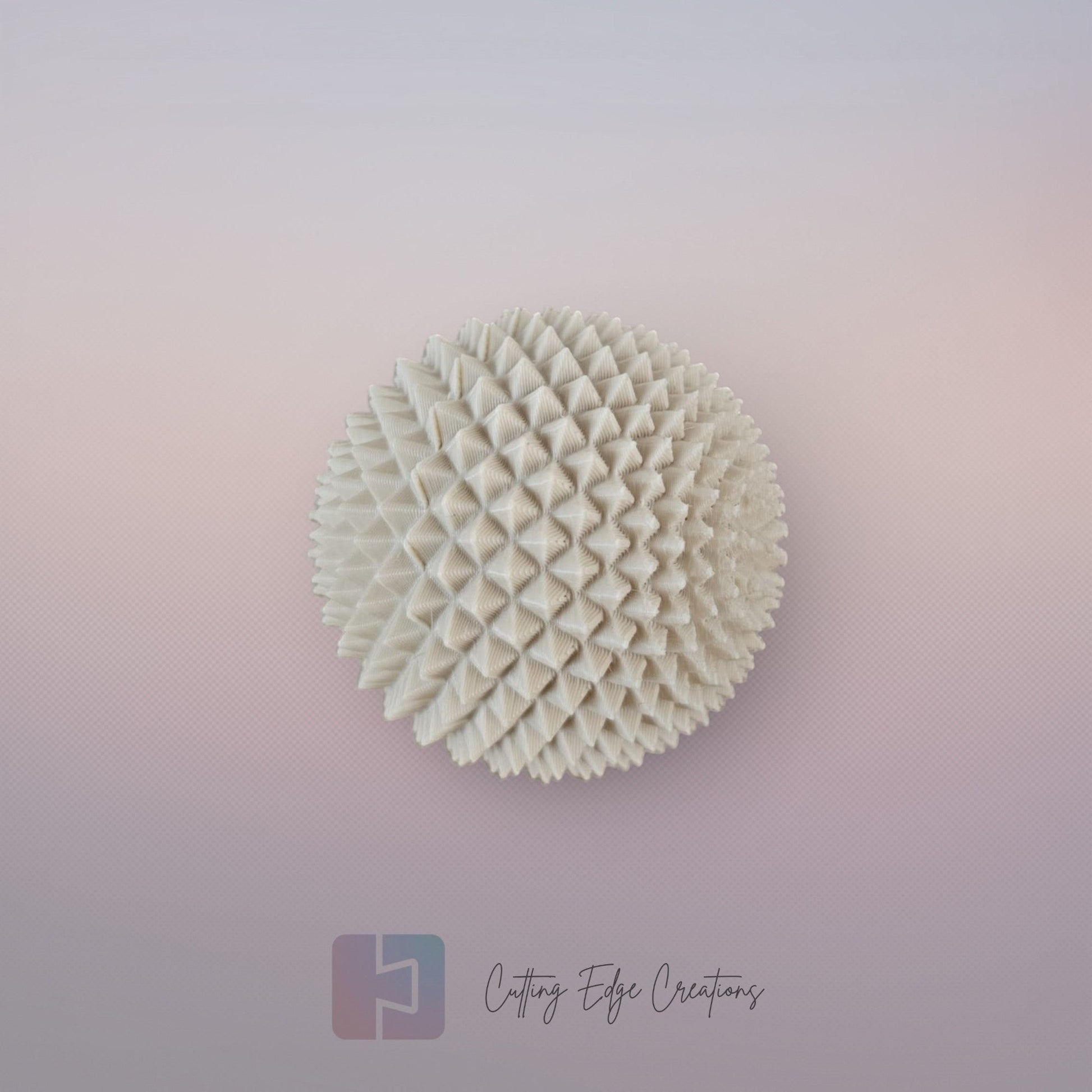 Cutting Edge Creations palm-sized Spike Sphere fidget toy, 5cm textured polymer with micro-spikes.