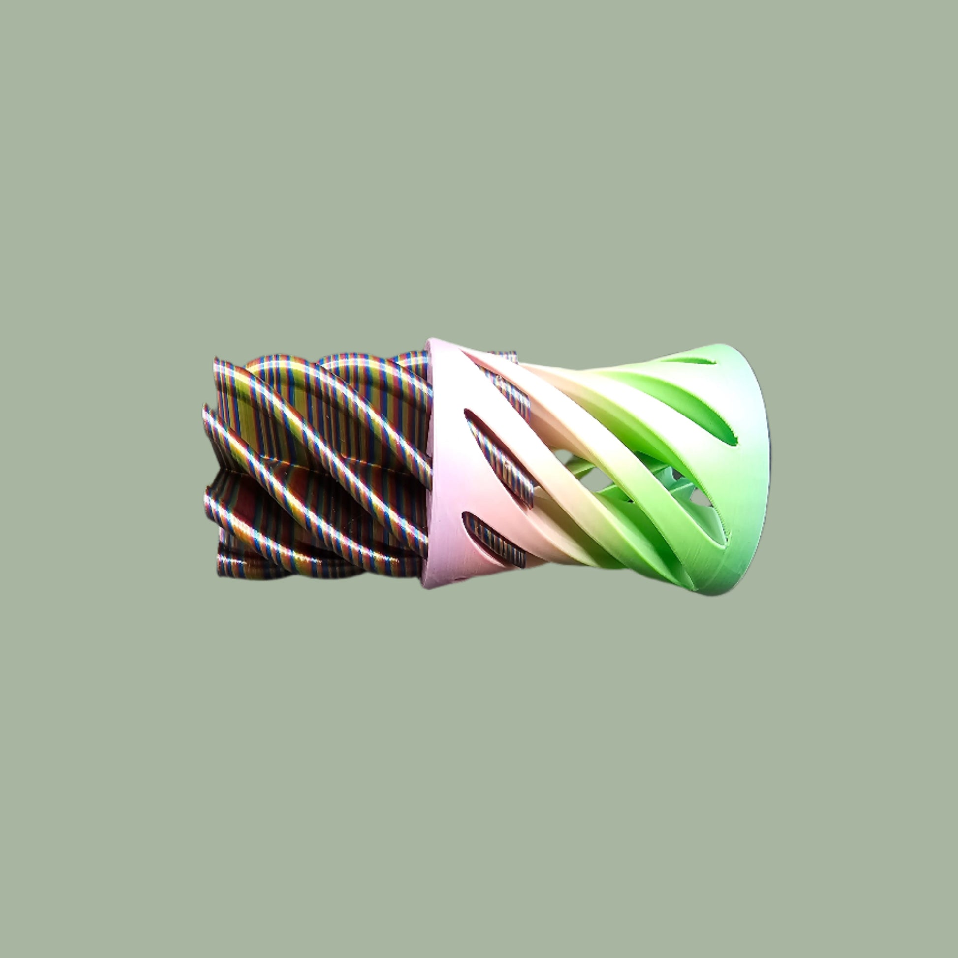 3D-printed Infinity Tubes in pastel and rainbow colours, featuring a spiral fidget design. Small, portable sensory toy made in the UK for stress relief and endless fidgeting