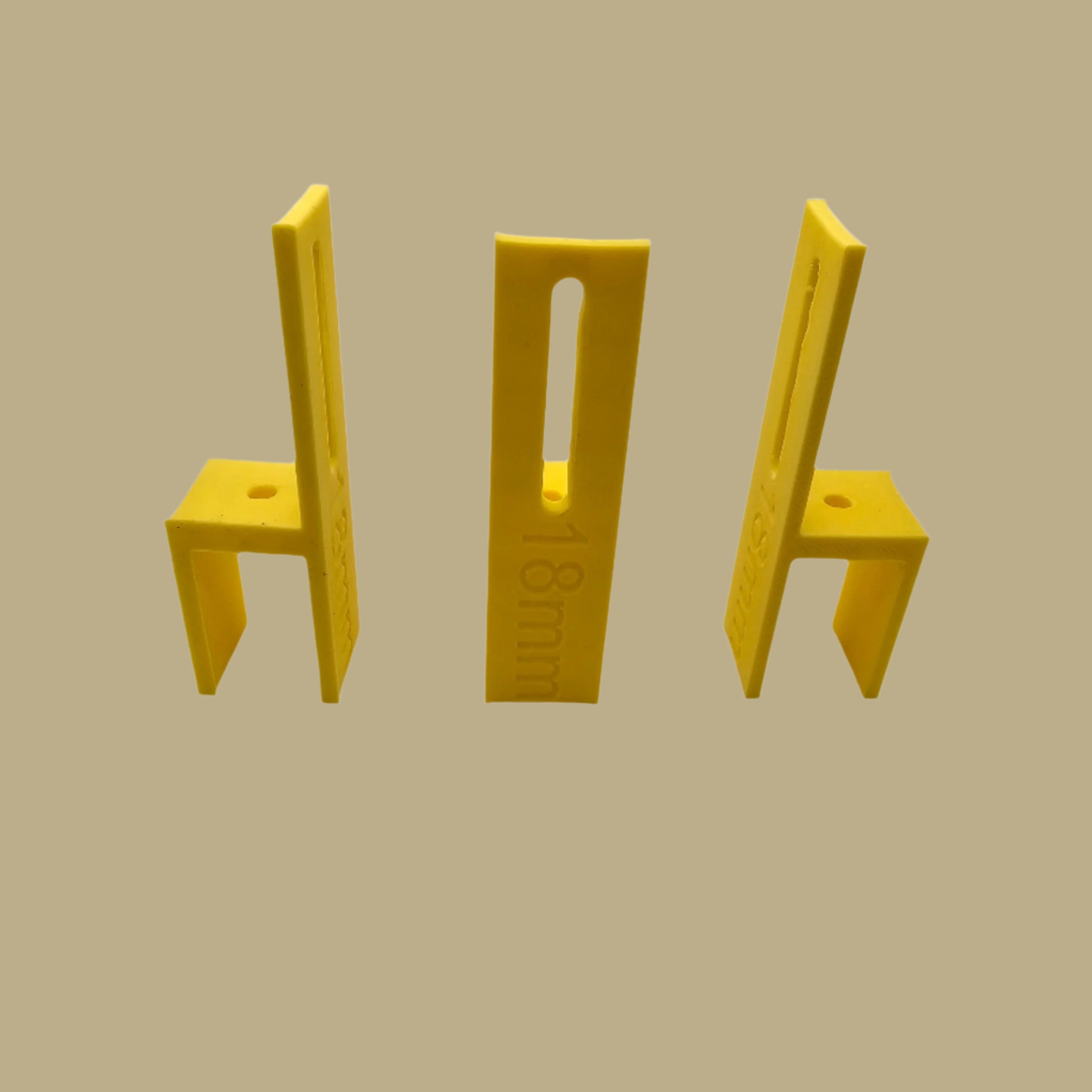 Set of three U Scribe jigs in bright colours for cabinet scribing and panel fitting