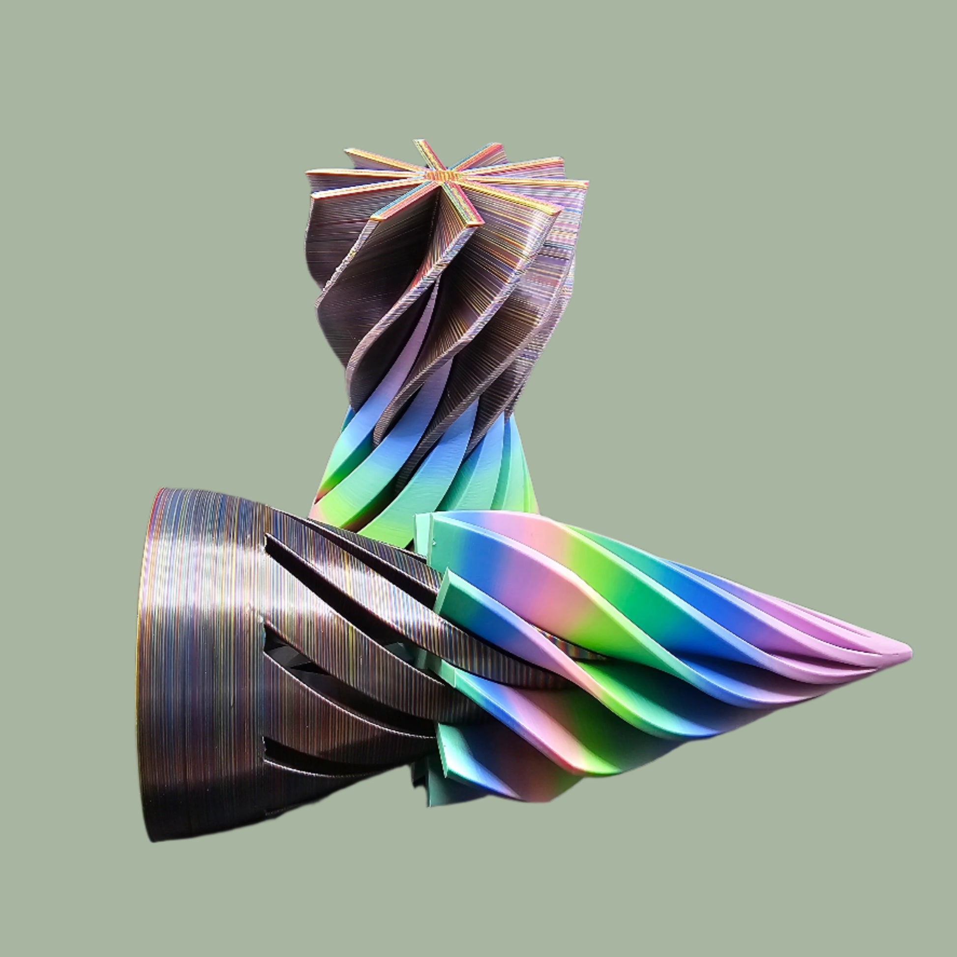 Large 3D printed Infinity Cone in vibrant multicolour filament with a mesmerising spiral design. A fun and tactile fidget toy, desk accessory, or unique home decor piece. Made in the UK and supplied in a random colour