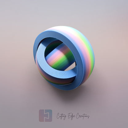 A 3D-printed Gyro Fidget Large toy with three interlocking rings
