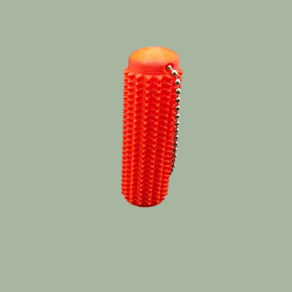 Mini Ouchie Pain Stim – a 7cm long, 3D-printed sensory tool with textured spikes for tactile stimulation, displayed against a neutral background. Includes a keychain for easy portability