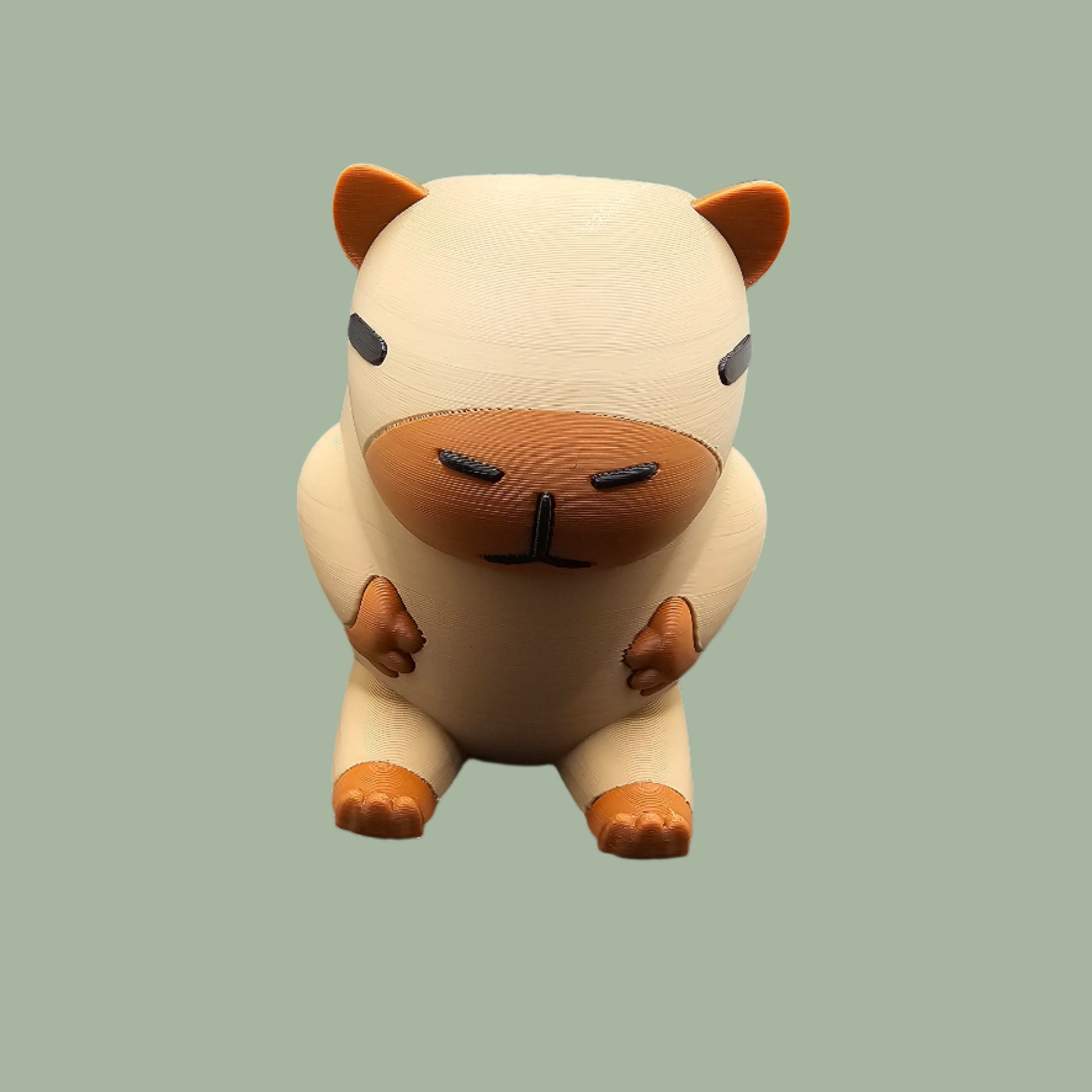 3D printed Capybara Pen Pot in a cute cartoon style, holding pens upright. A fun and functional desk organiser, designed and made in the UK. Perfect for stationery storage and office decor