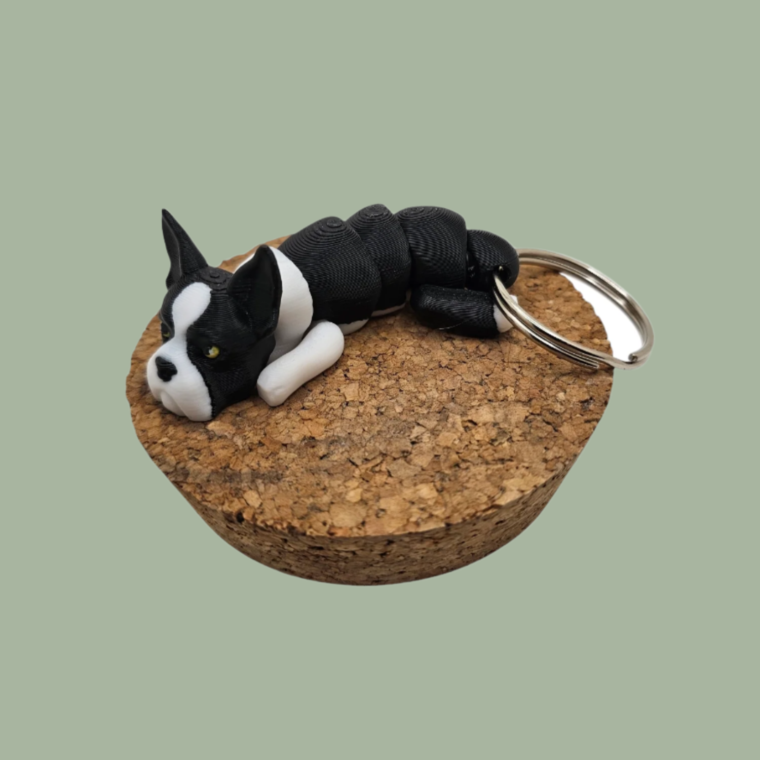 Black and white articulated dog keyring with pointed ears